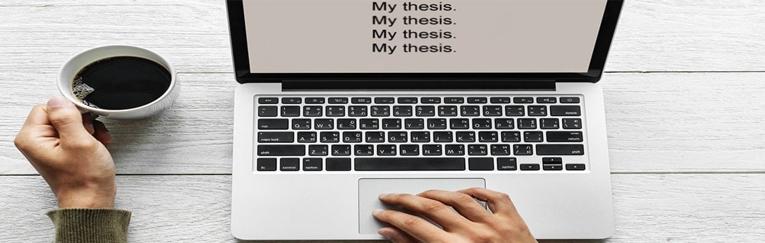 Typing out thesis on laptop