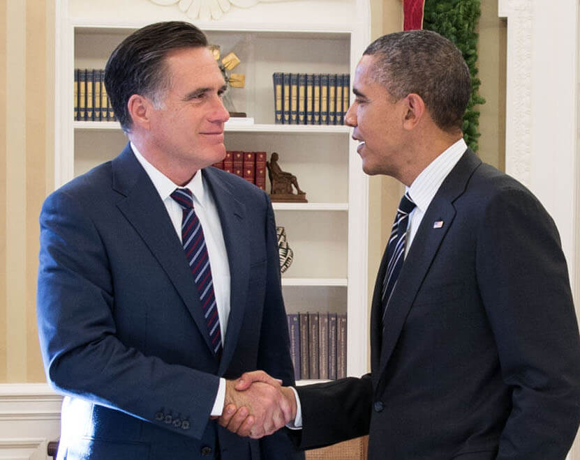 Obama and Romney shake hands in oval office.