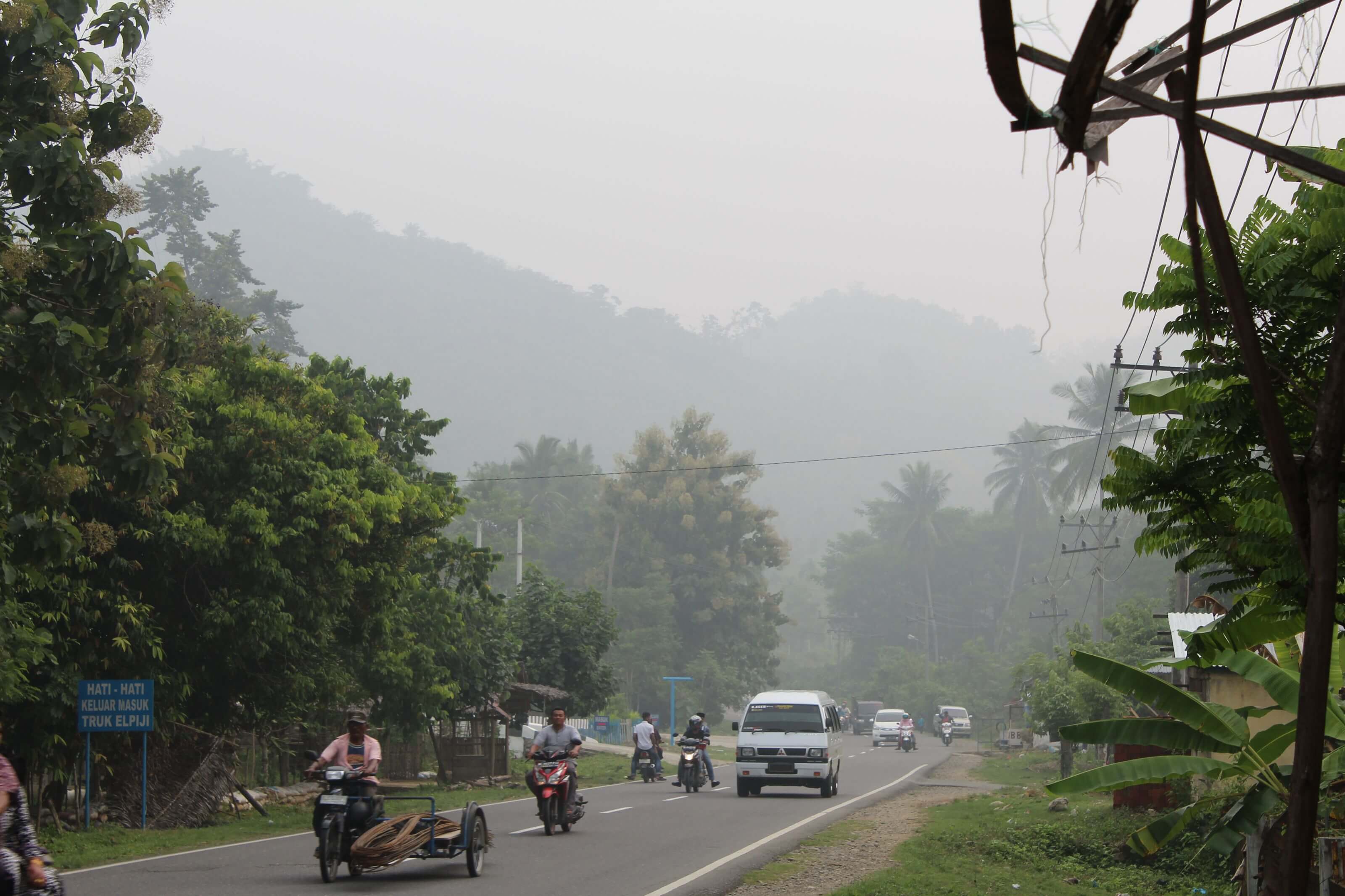 Smog limits visibility on this street in Indonesia in this 2015 Wikimedia Commons photograph via WorldNews (WN) Network.