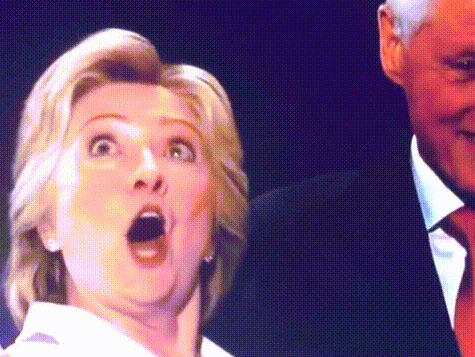 Hillary Clinton is agape as she looks up at balloons falling during Democratic National Convention.