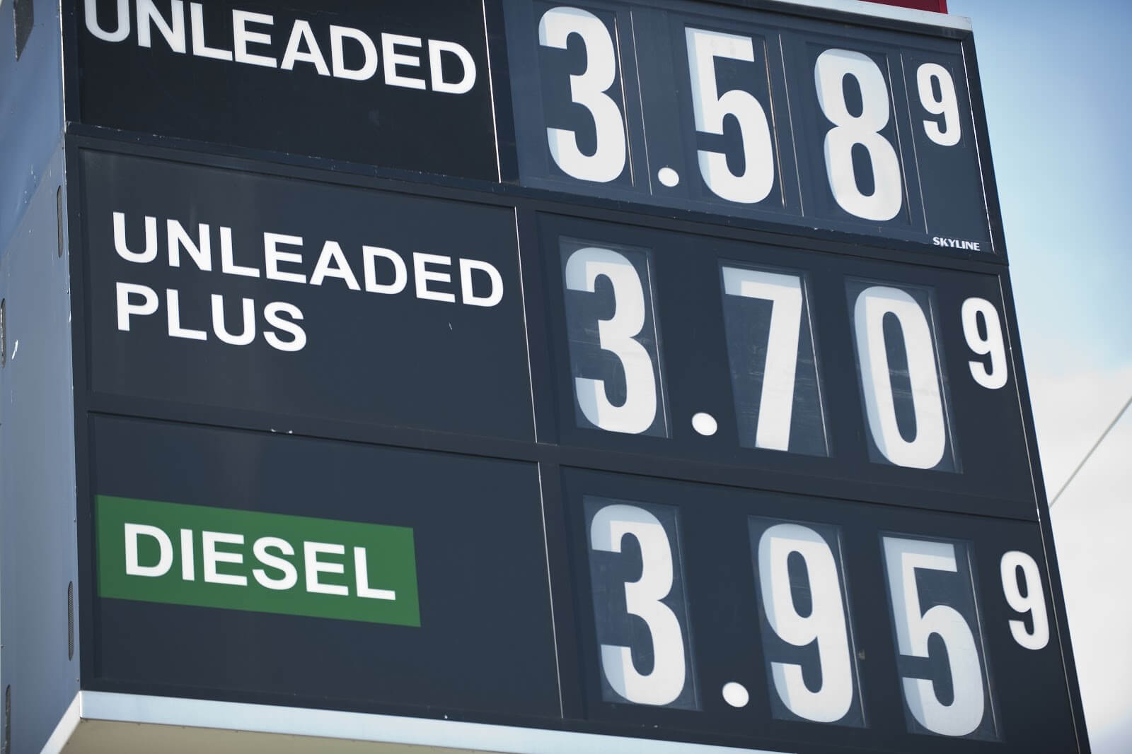 A gas station sign shows the price of gas - Fred Hall - Getty Images