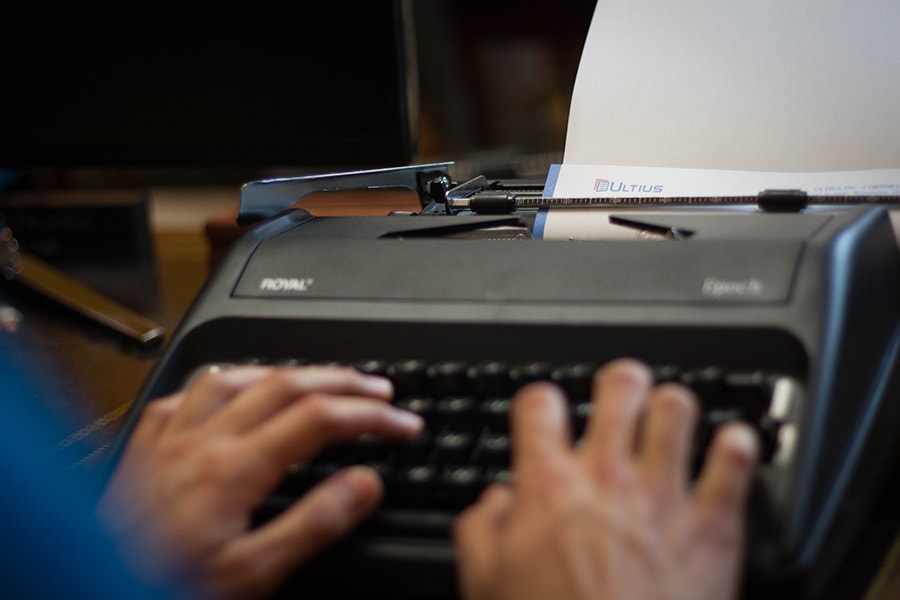 Writing on a typewriter.